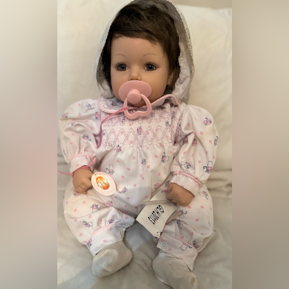 Adorable Baby Doll with Pink Outfit